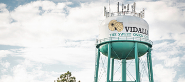 Vidalia, Georgia / USA - March 25, 2019: The water tank tower of the city of Vidalia located at 1st Avenue in Vidalia, Georgia 30474, USA.