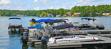 Fairfield Plantation Villa Rica, GA - July 2, 2018; Boats tied up at the Marina on a private recreational lake