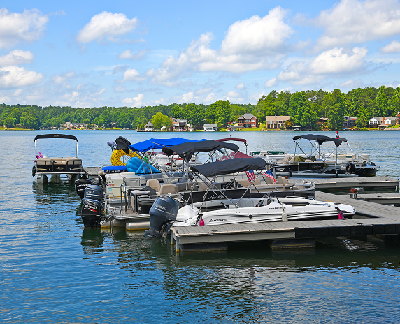 Fairfield Plantation Villa Rica, GA - July 2, 2018; Boats tied up at the Marina on a private recreational lake