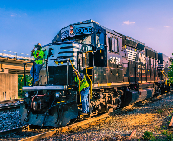 Chamblee, Georgia, USA - May 20, 2014: Norfolk Southern train #3058 passes through Chamblee, Georgia.