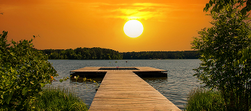 Calm shoreline view of Lake Acworth with water, trees, and nearby park surroundings in Acworth, Georgia
